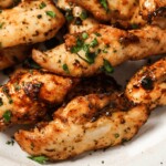 Close up of air fryer chicken tenders.