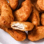 close up photo of a bowl of frozen air fryer chicken tenders