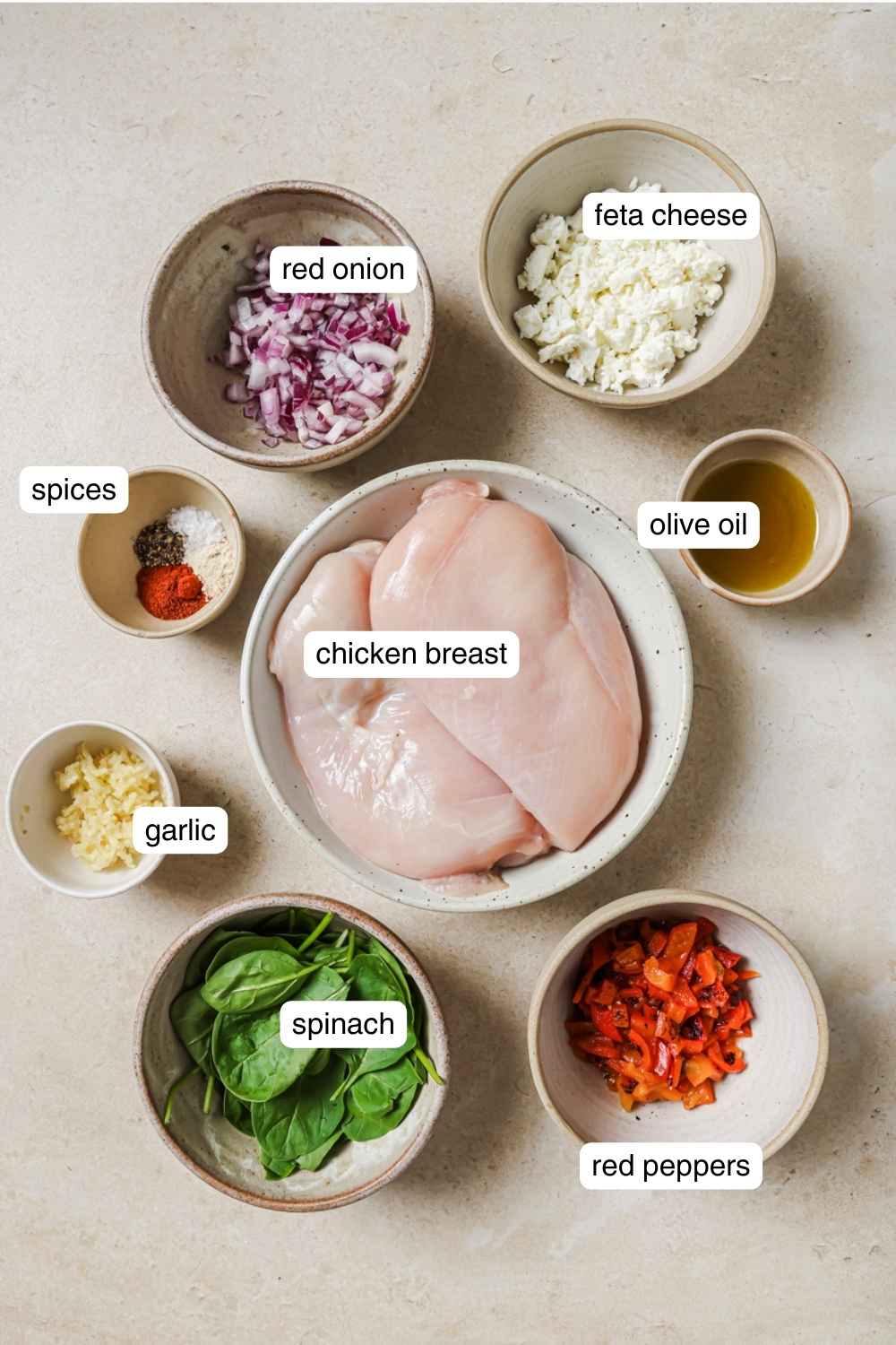 Labeled ingredients for air fryer stuffed chicken breast.