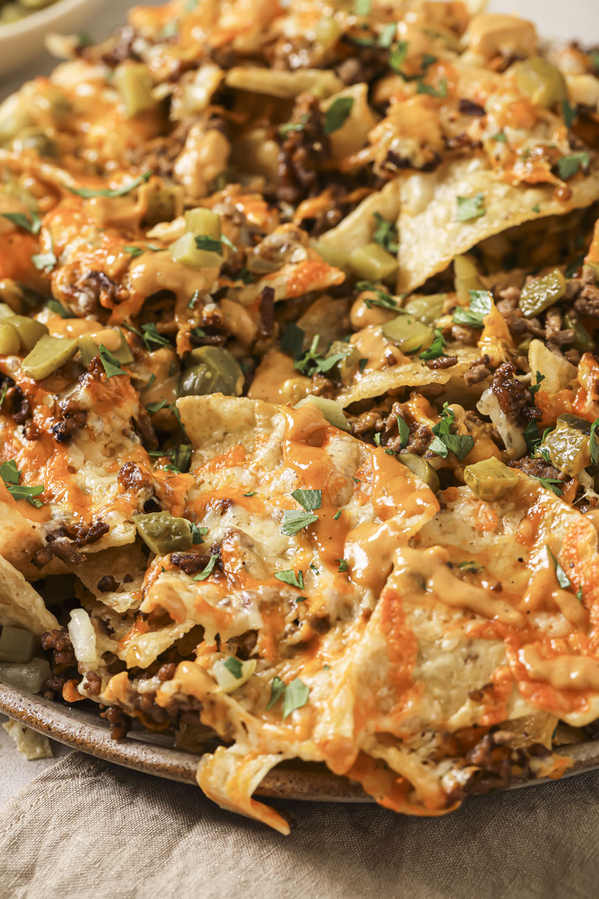 Close up of air fryer nachos on a plate.