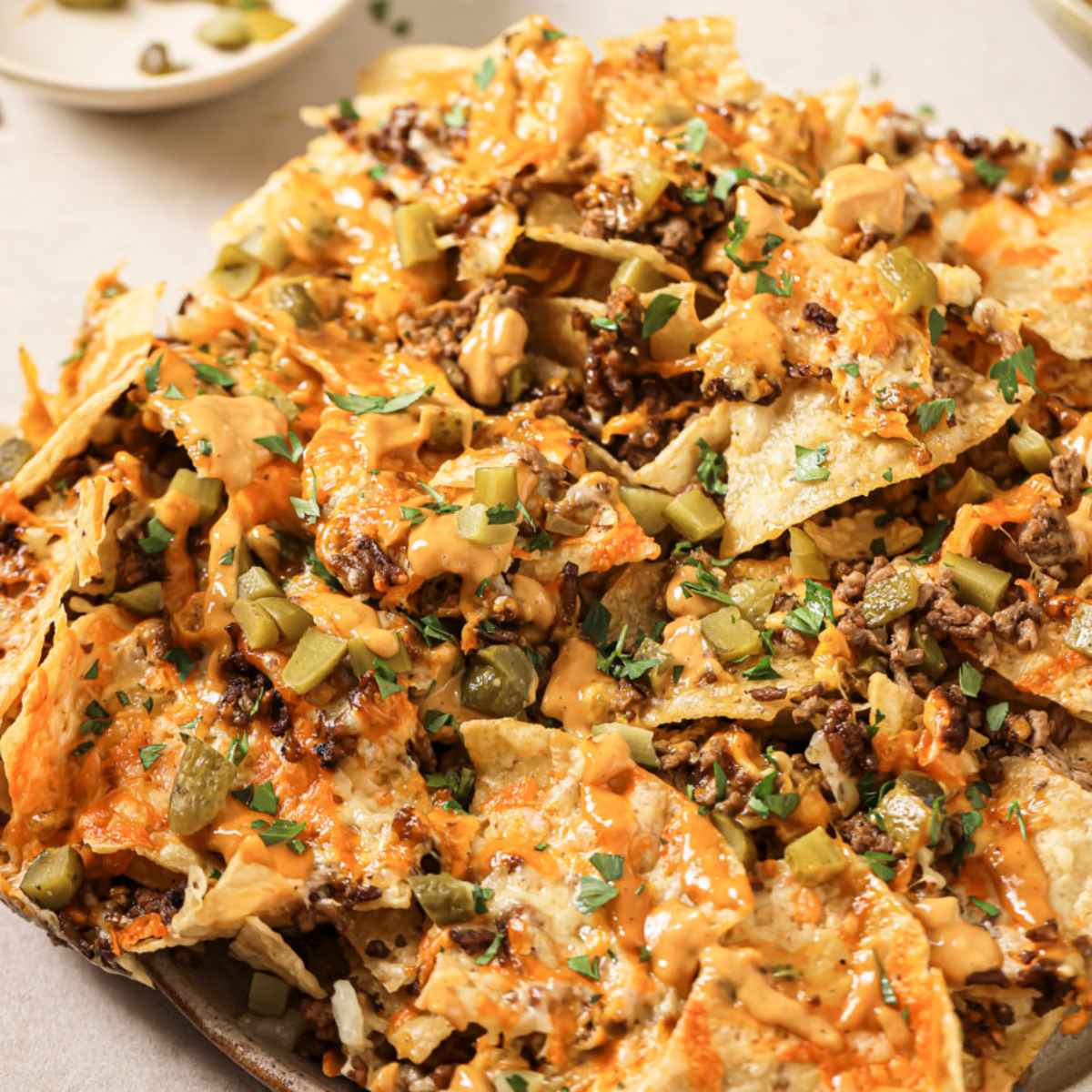 Close up of a plate of air fryer nachos.