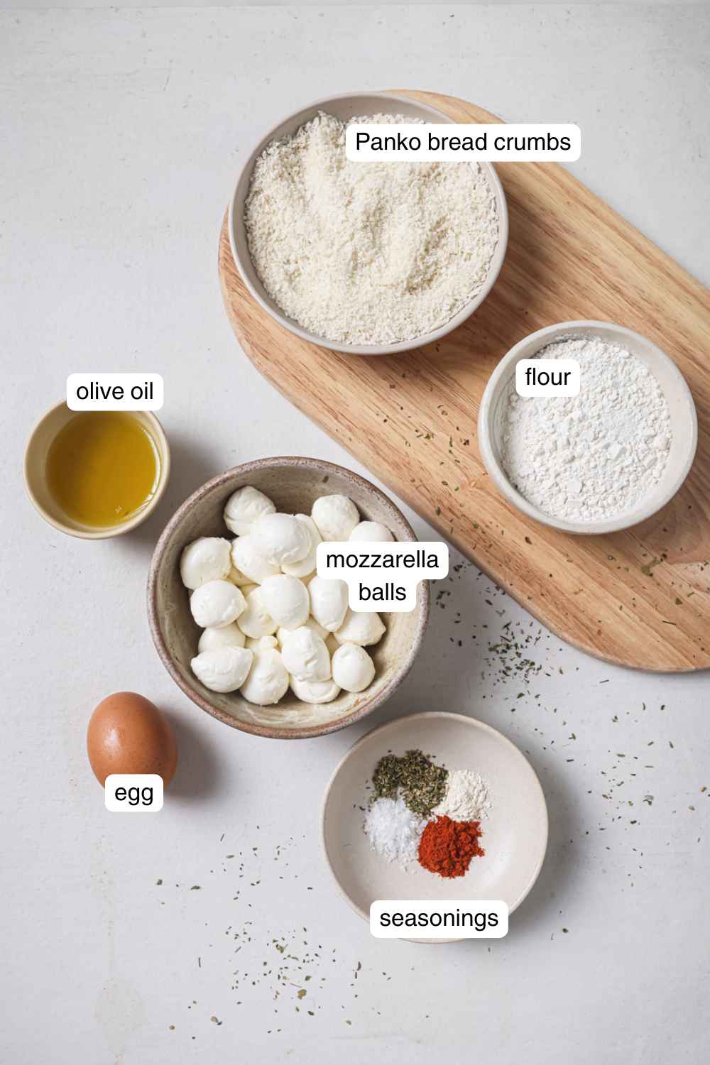 Labeled ingredients for air fryer mozzarella balls.