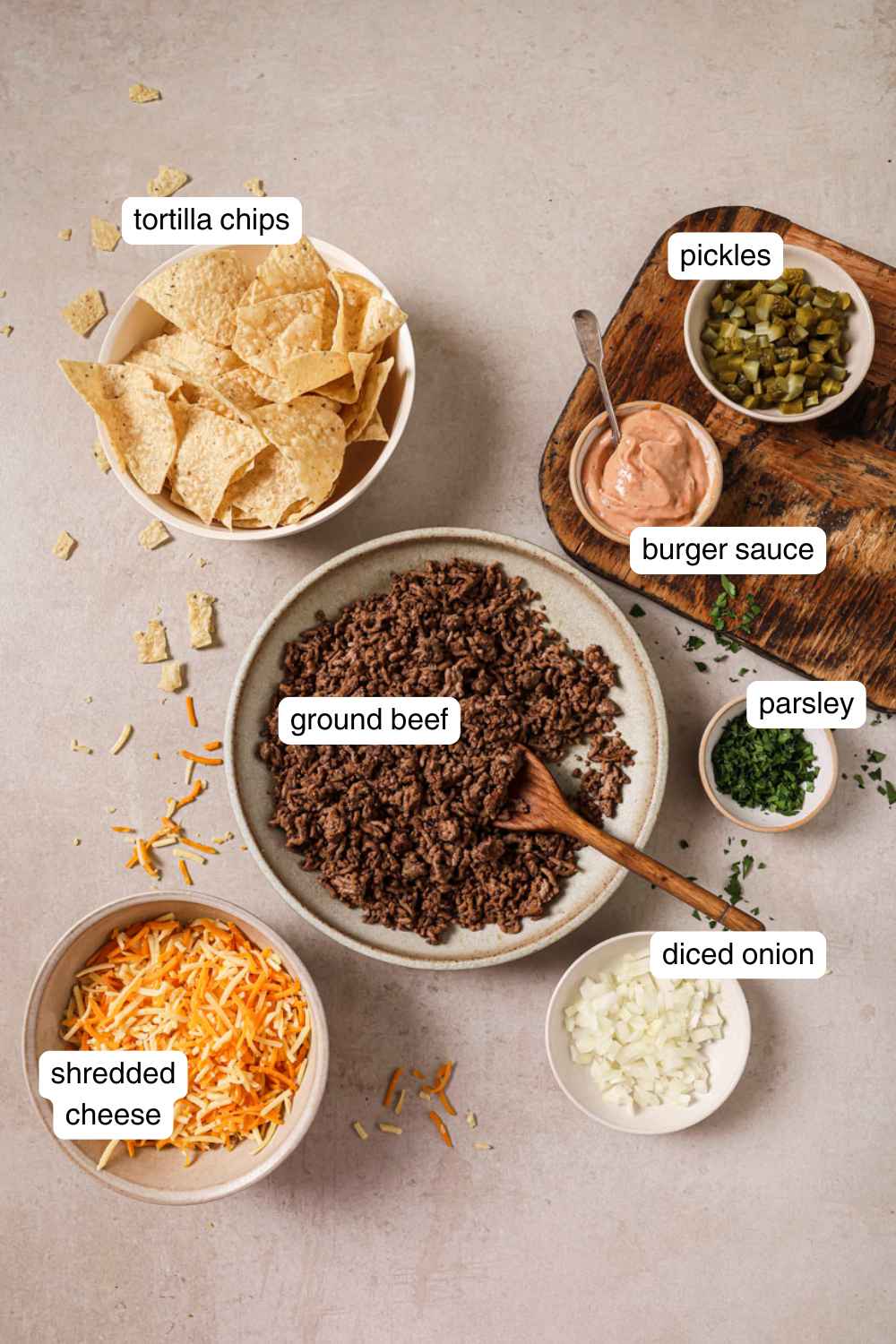 Labeled ingredients for air fryer nachos.