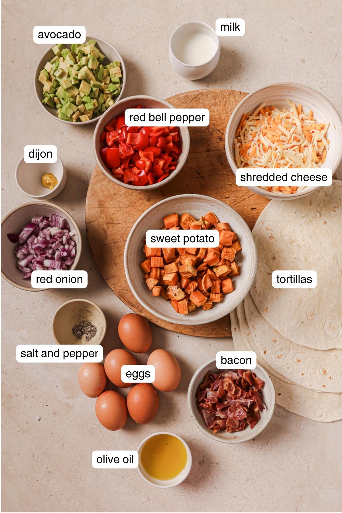 Labeled ingredients for air fryer breakfast burritos.